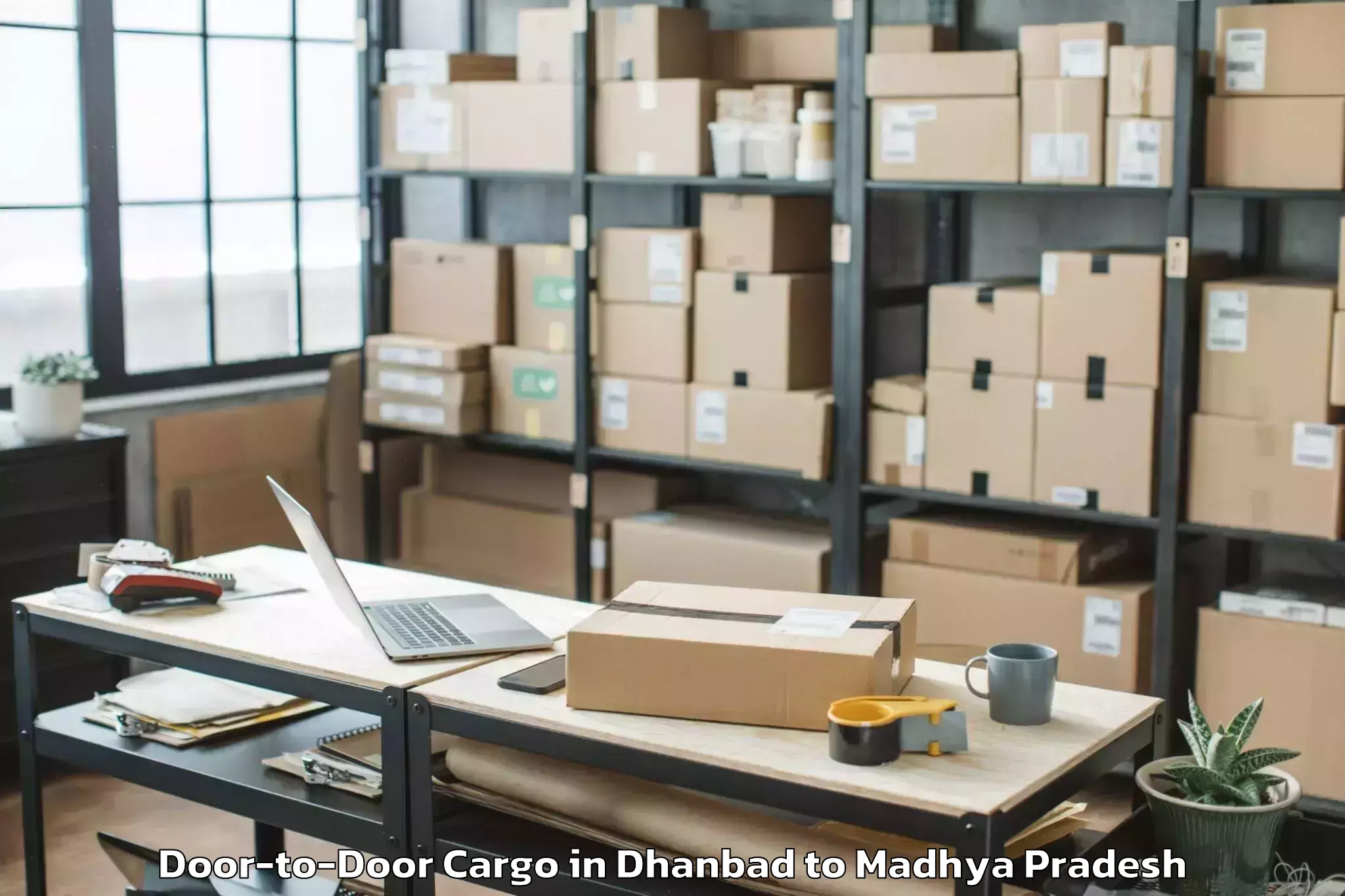 Quality Dhanbad to Sage University Indore Door To Door Cargo